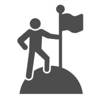 person planting flag on mountain top